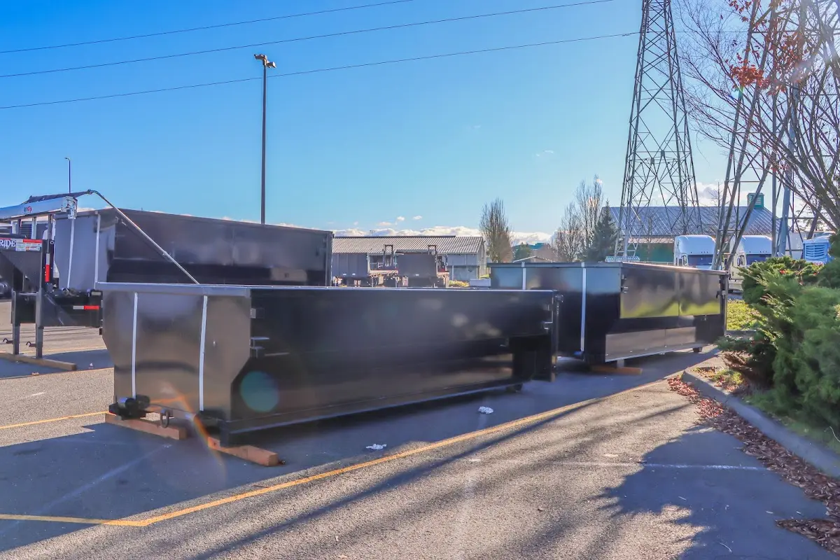 Roll-off dumpster ready for waste disposal at job site for Roll Off Dumpster Rental in East Flat Rock